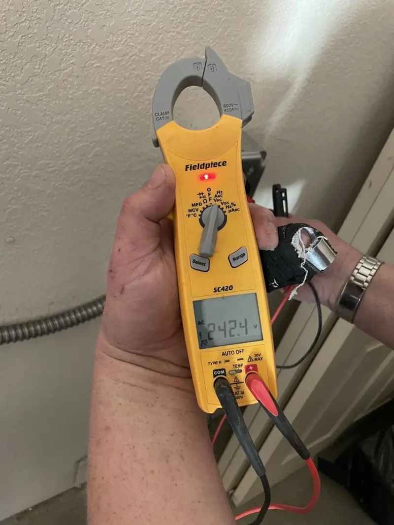 Voltage testing with clamp meter during Generator Installation in Loxahatchee Groves